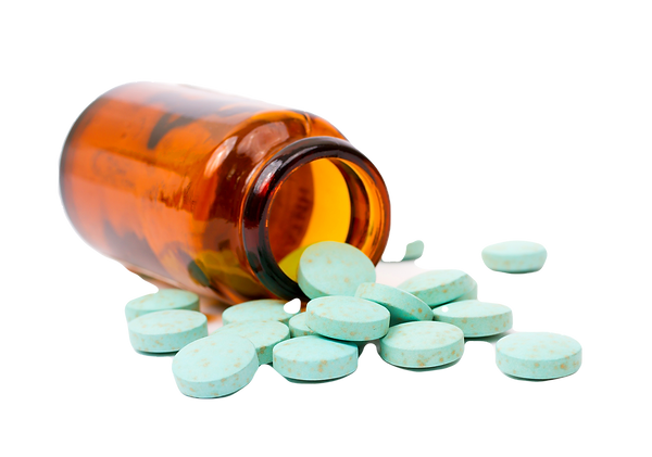 Pills%20in%20apothecary%20bottle_edited.