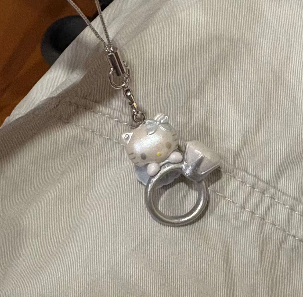 Silver Hello Kitty Mini Doll Holding Engagement Ring Keychain