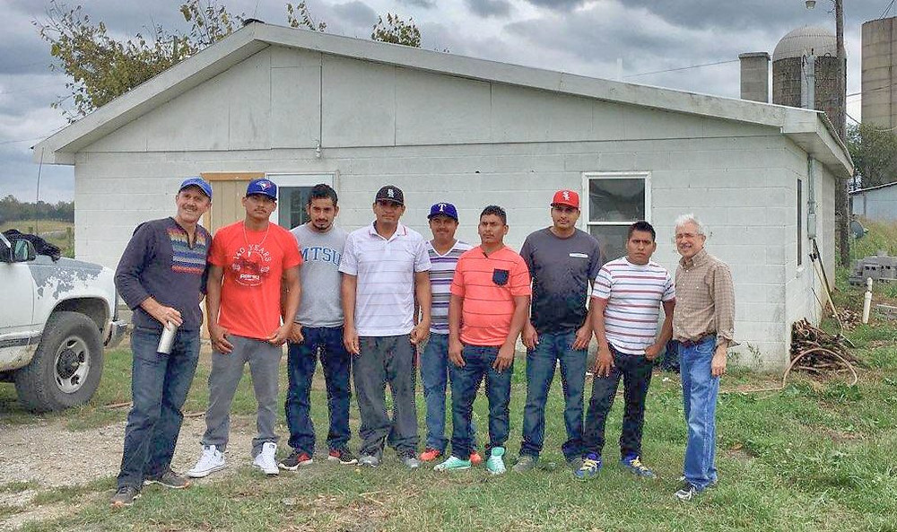 Stephen Bartlett of FLOC (left) with striking farm workers Lamberto Gonzales, Fernando Guzman, Francisco Gonzales, Hernan Quezada, Jose Gonzales, Cristian Santillan, Adolfo Osorio; and Felix Garza of the National Farm Worker Ministry.