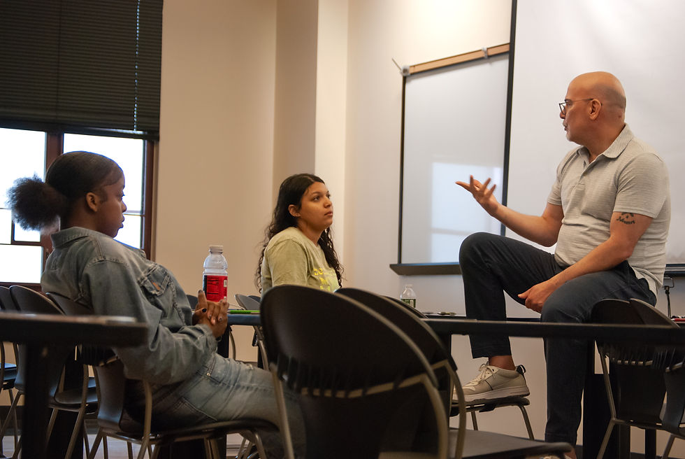 College counselor Jose Mercado encourages scholars to pursue their dreams.