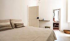 double bedroom of the very bright mezzanine studio apartment