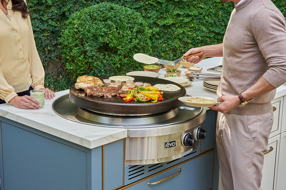 Chef cooking on an EVO flat-top griddle