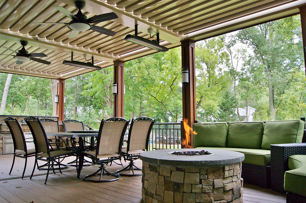 Stone gas fire pit on a covered deck with overhead patio heaters
