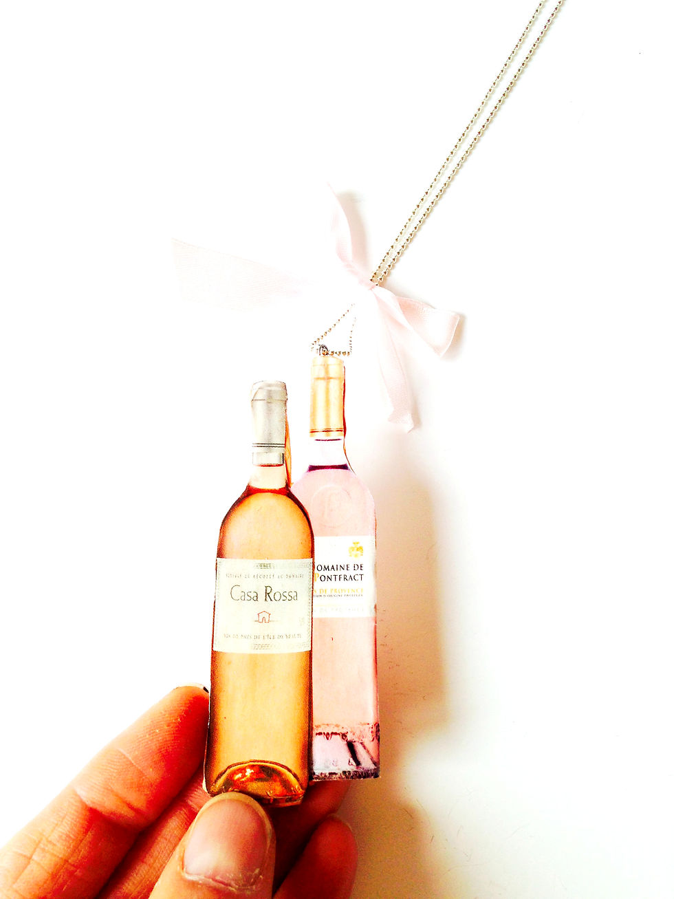 Thumbnail: Sautoir CÉLÉBRATION bouteilles de rosé