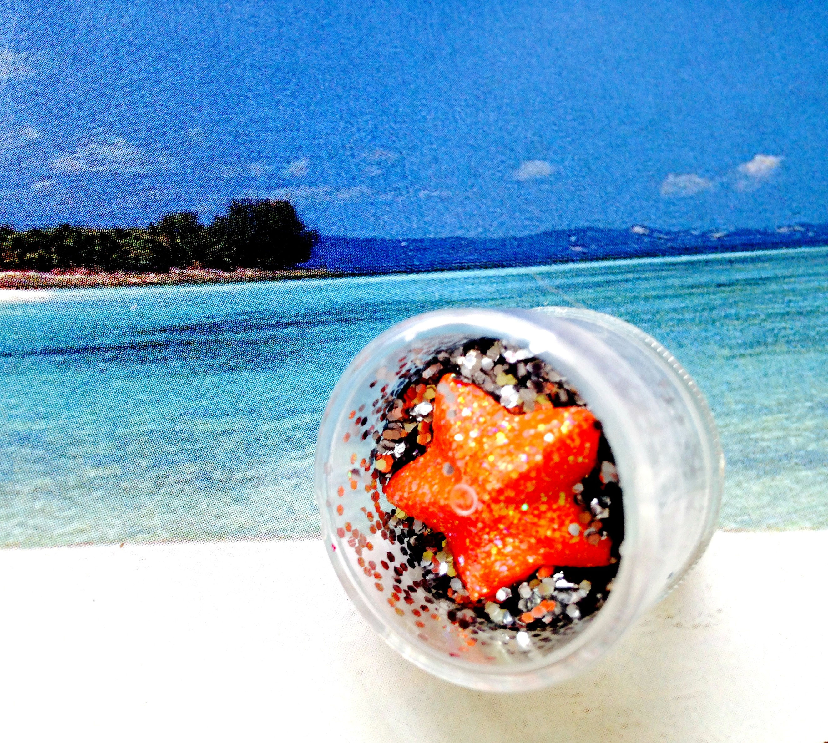 CARAÏBES Bague L'ÉTOILE DE MER orange paillettes argenté