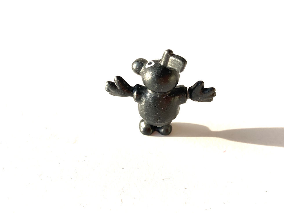 Miniature : Figurine plastique vintage mini gugusse noir