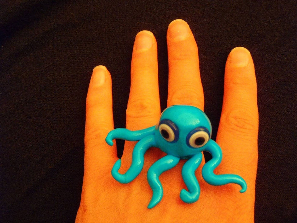 Thumbnail: Bague THE OCTOPUS petite pieuvre bleue turquoise