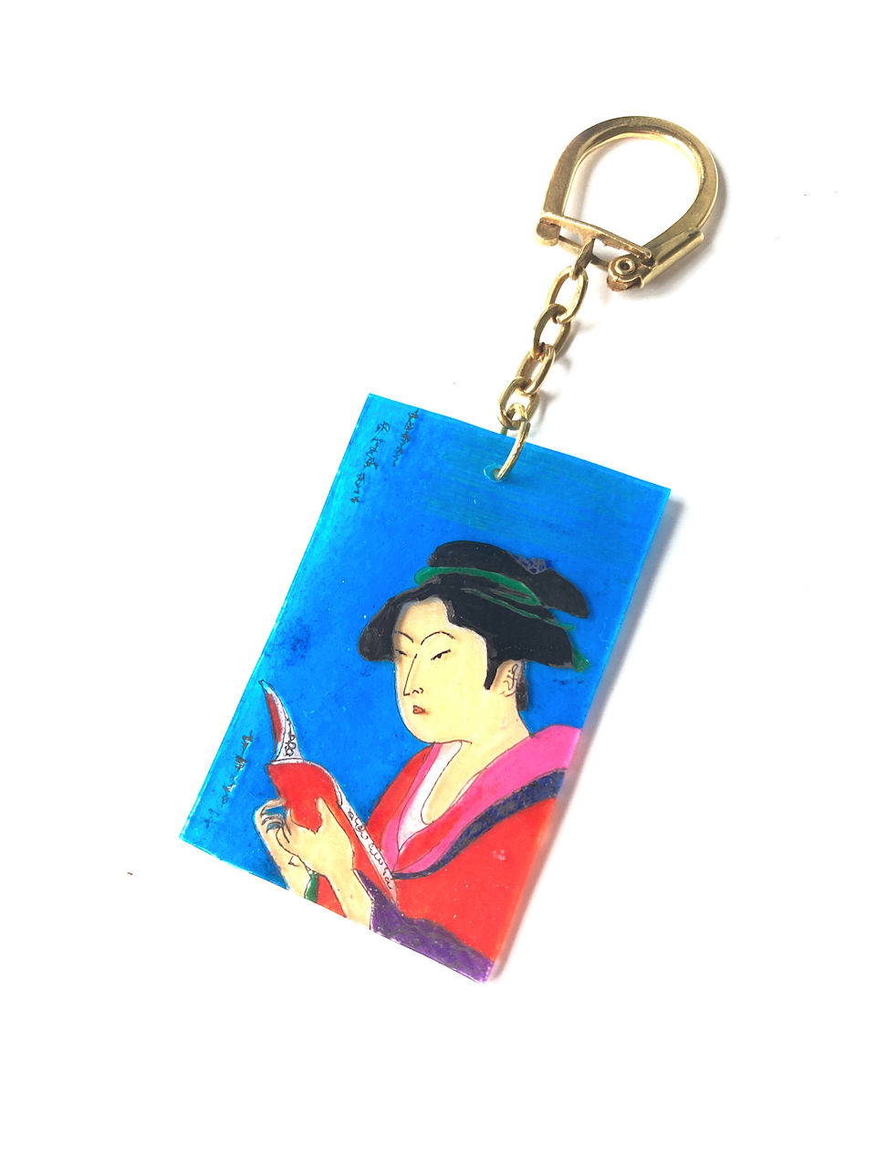 Porte cle La lectrice par © The Sausage Jewels