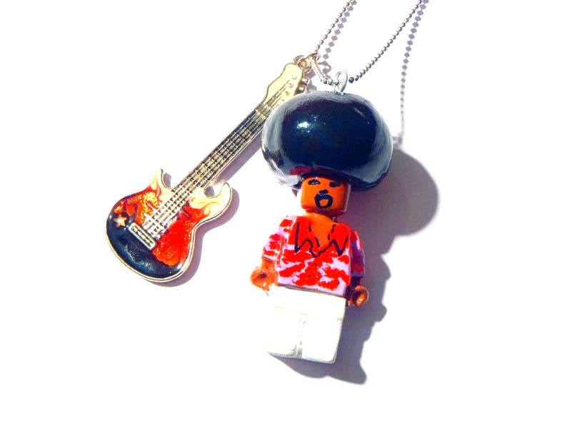 Sautoir PROLÉGOMÈNE JIMI bonhomme et guitare miniature