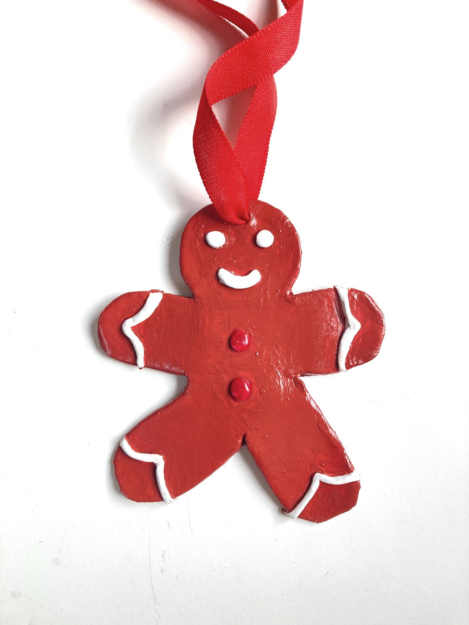 Bonhomme pain d'épices déco de noël faite main en argile rouge peinte