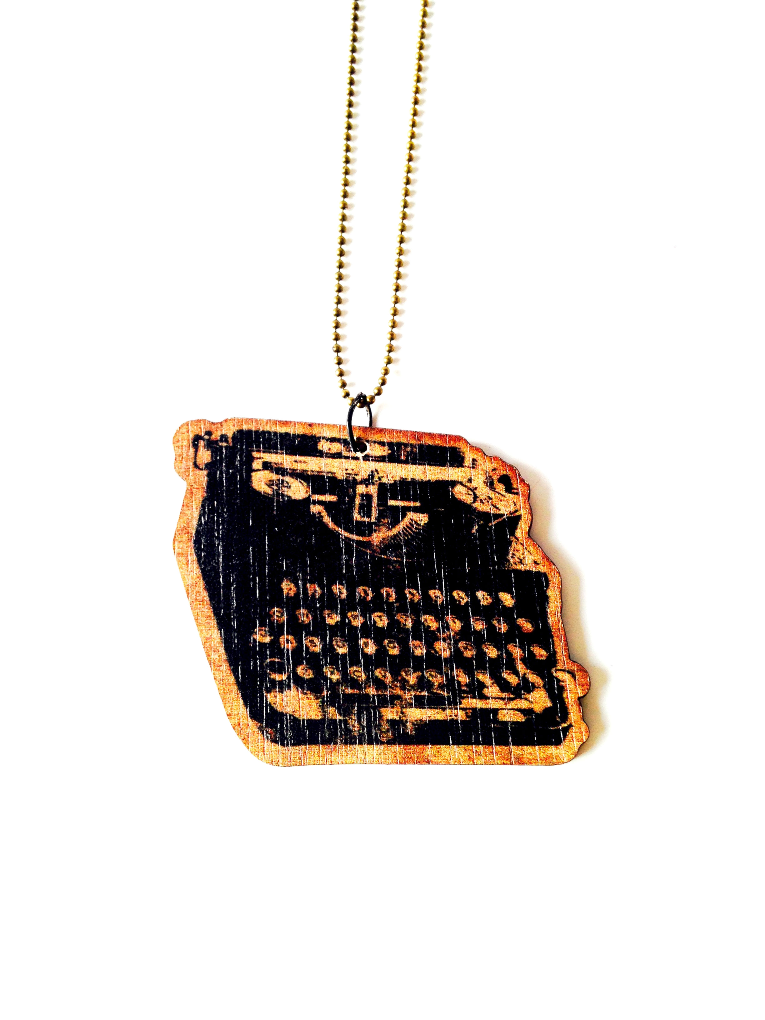 sautoir bronze avec pendentif machine à écrire ancienne