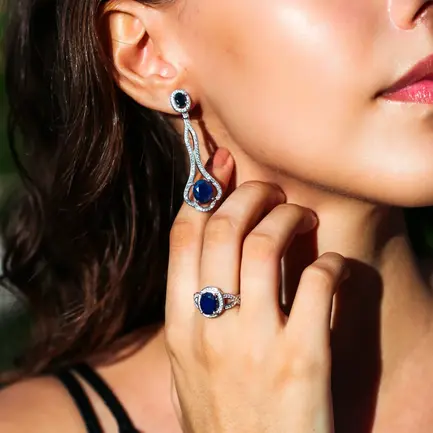 Rona-Gems-and-Jewelry-Woman-Showing-Jewelry-Close-Up-1024x1024