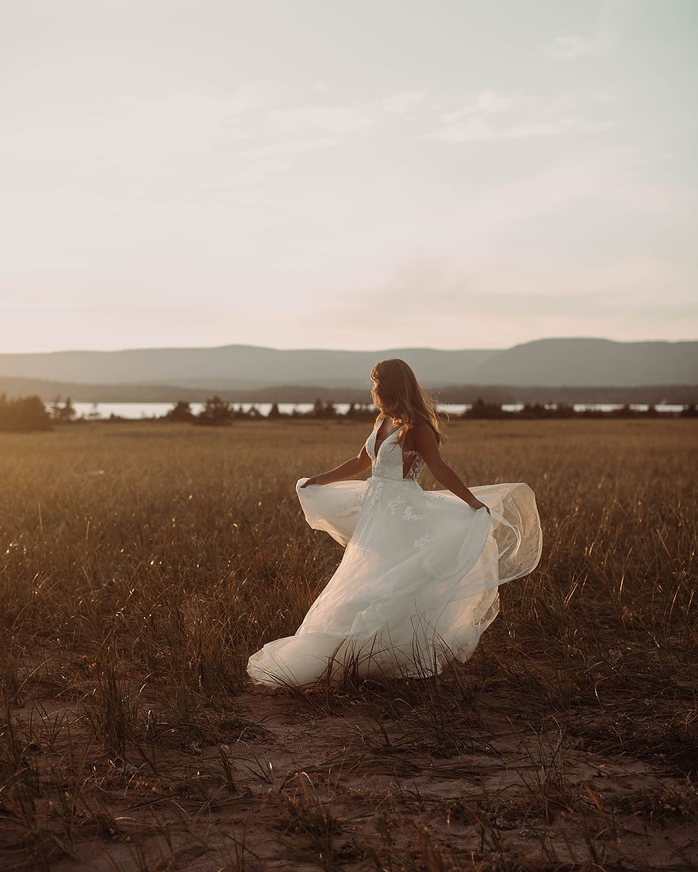Bride twirling her dress during golden hour
