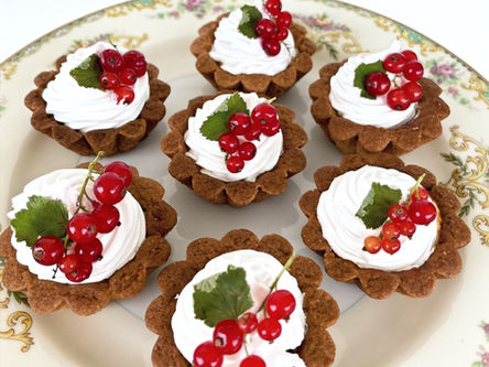 Delicate Red Currant berries atop macaroon treats