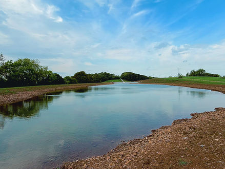 Wide angle view of the Mendip Lake - a brand new watersports site coming to Somerset in Spring 2027.