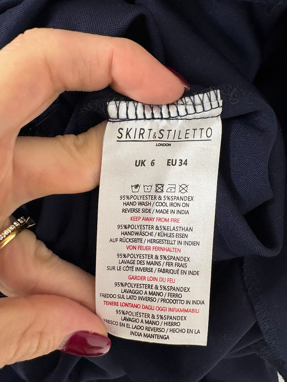 Miniaturbild: Etikett mit Text SKIRT STILETO UK 6 EU 34 Informationen über Material und Pflege.
