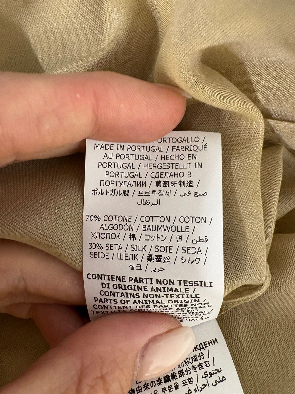 Miniaturbild: Etikett mit Text: MADE IN PORTUGAL, 70% COTONE, und weitere Details. BRAX oversize Bluse Gr. 38