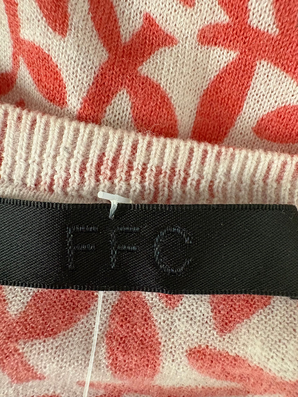 Miniaturbild: FFC Label on a pink and orange patterned shirt for clothing brand