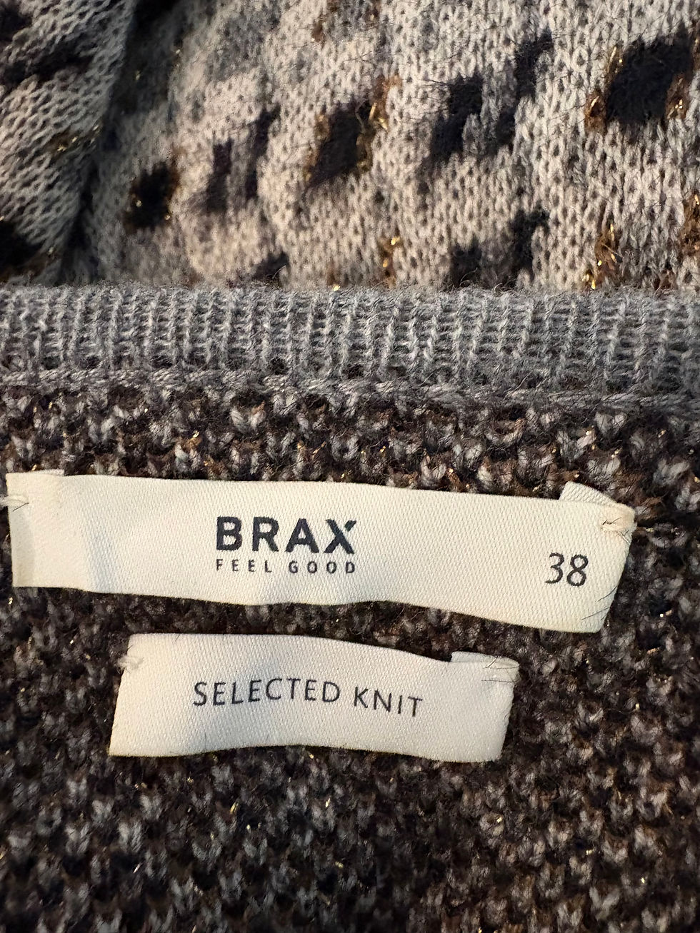 Miniaturbild: Brax Feel Good Selected Knit label with size 38 on textured fabric background.