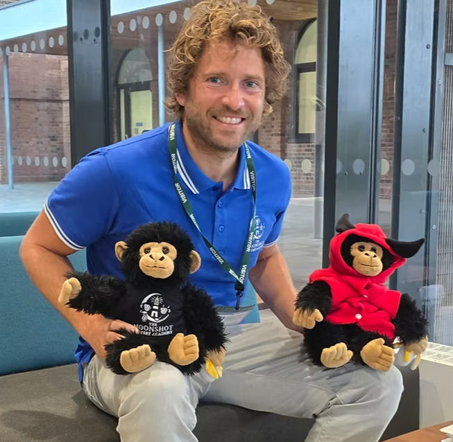 Matt at the Milo's visiting a School