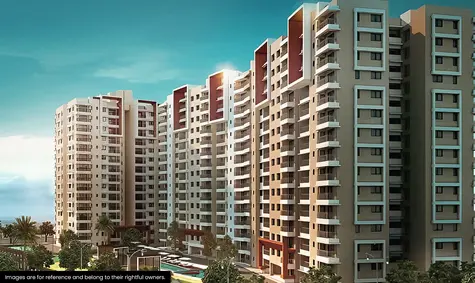 A modern high-rise apartment complex with multiple buildings featuring balconies and a focus on environmental solutions. The structures boast a combination of beige and maroon accents. Green areas with trees surround the pool in the foreground under a blue sky, promoting sustainable living.