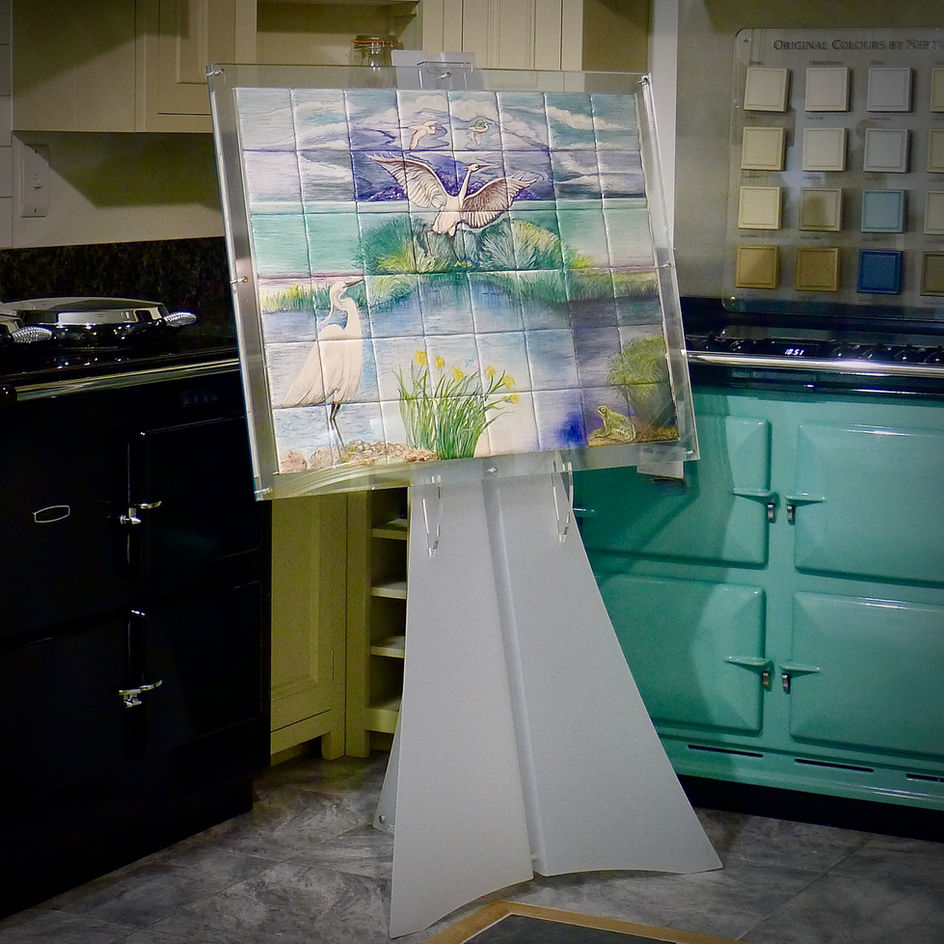 Water birds artwork displayed on easel