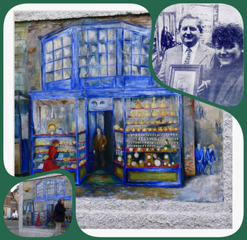 Mural depicting a blue shop, couple with award