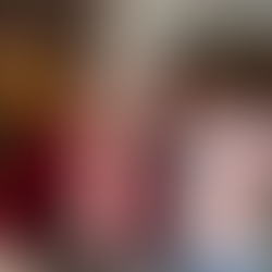 Woman and Santa Claus posing for photo