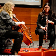 Live Performance Image of Darci Gamerl & David Downing - Bel Canto Duo performing live at TEDxOmaha 2024. Photo by NOTYOURAVERAGESUCCESSSTORY