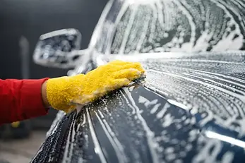 exterior wash on a car at like new car detailing shop