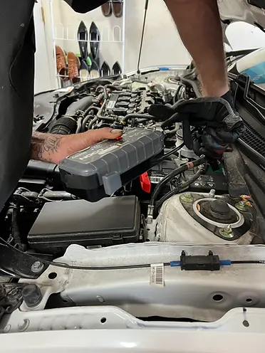 Mobile jump start service in Oahu using a battery booster pack