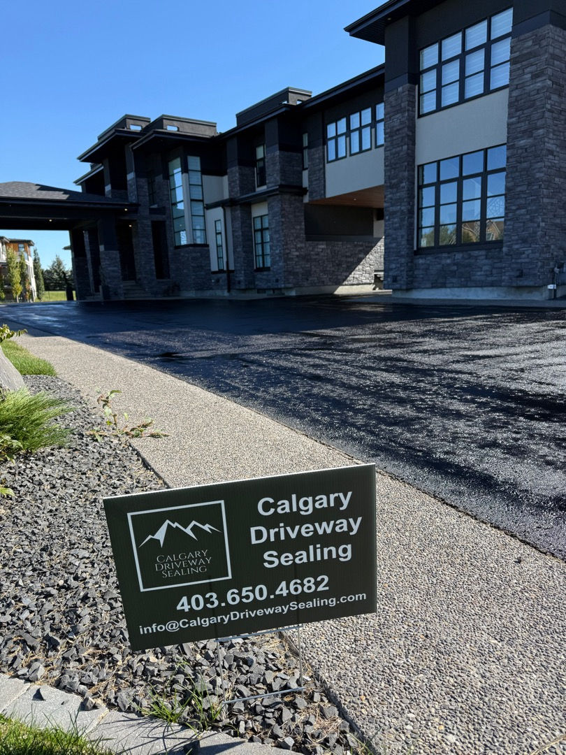 asphalt house with sign