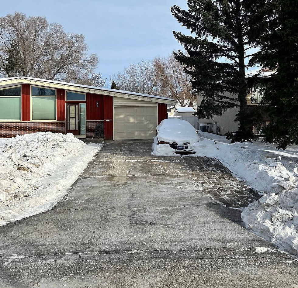 Cleared driveway at snowy house, example of outdoor services