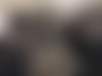 Photo booth prop table with themed signs and heart-shaped glasses ready for guests at a Houston event activation.