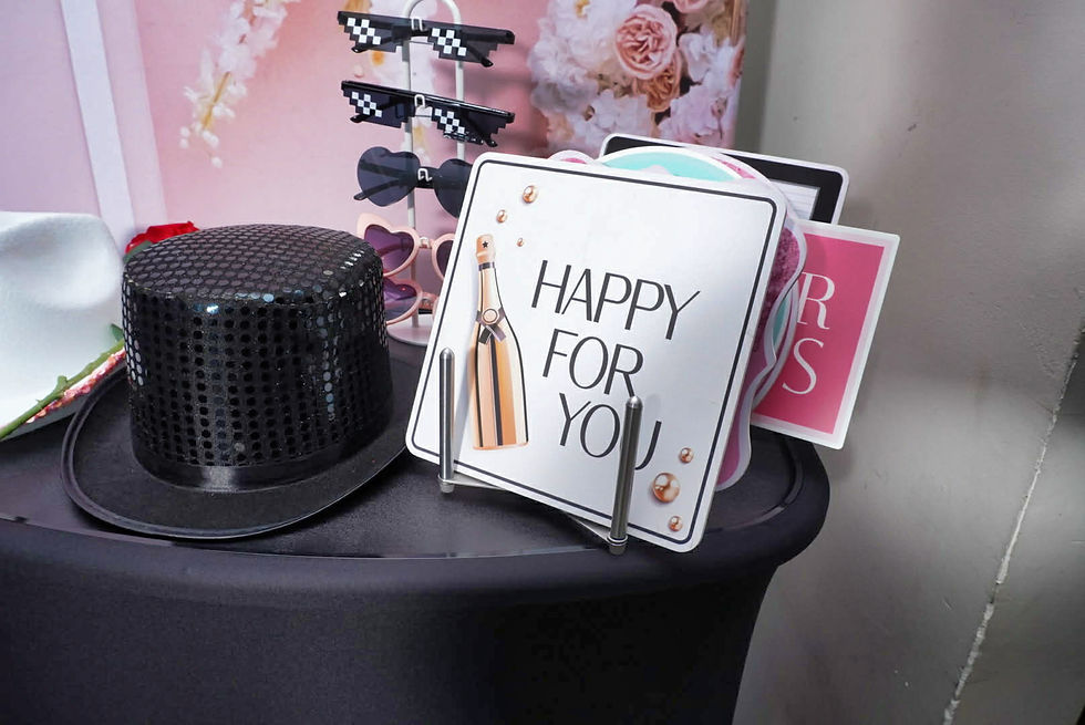 Close-up view of photo booth props on a table