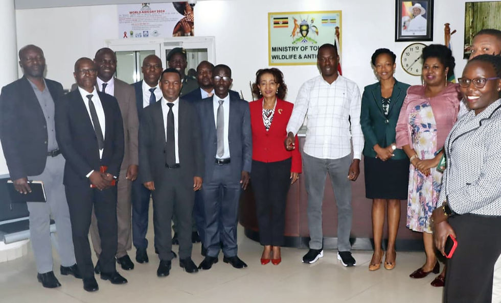 Hon. Martin B. Mugarra, the State Minister for Tourism, Wildlife and Antiquities (C), Tourism Sector Leaders, Private Sector Players, and Ministry officials pose for a photo after a planning meeting at the Ministry head offices in Nakasero, Kampala, Uganda.