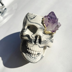 ceramic skull with crystal