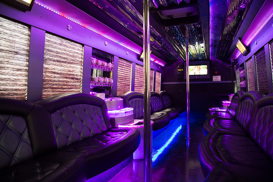 Large party bus interior lights at night