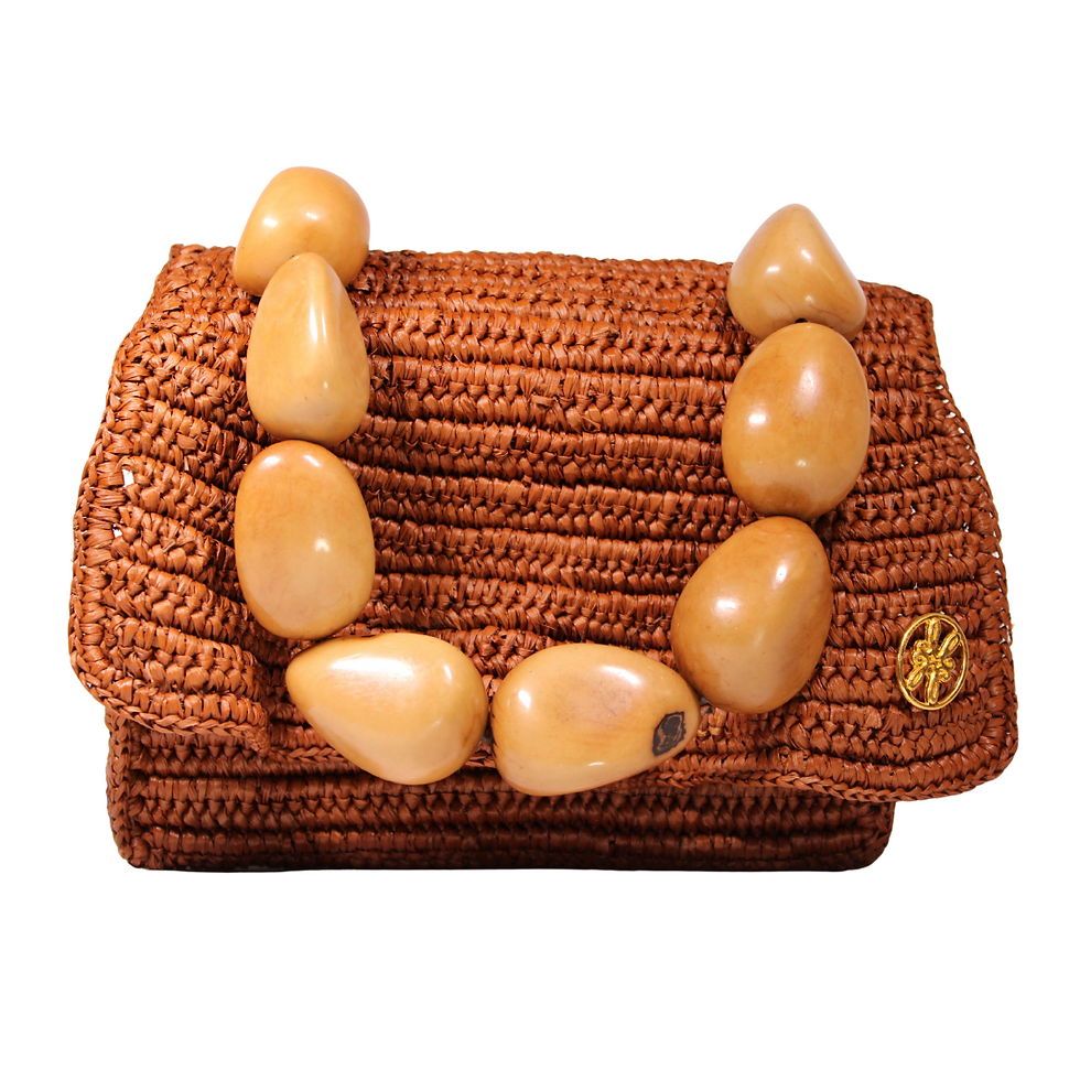 Crochet-embroidered Muse Mini Bag made from 100% toquilla straw with a natural tagua handle.