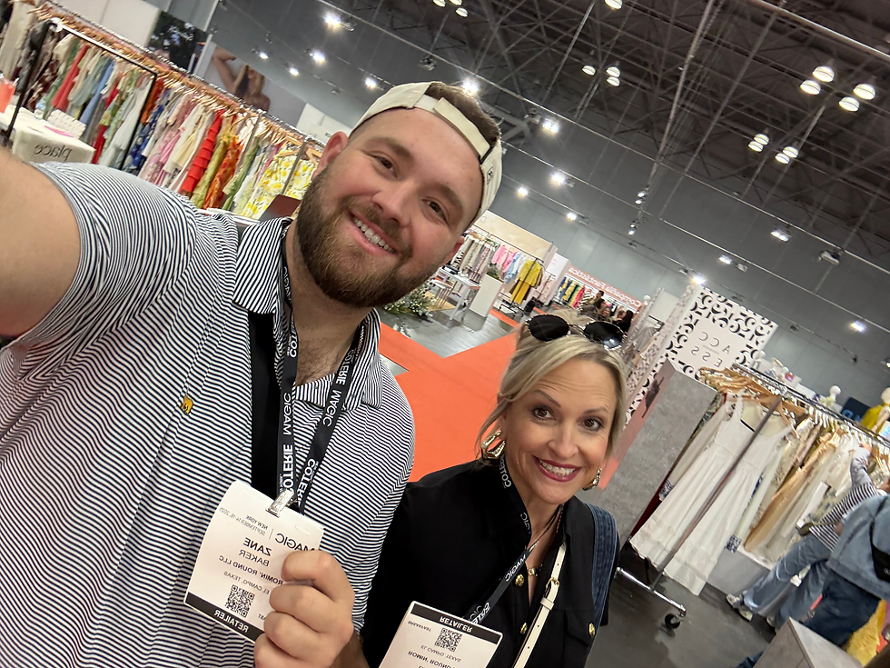 Two people taking selfie at trade show
