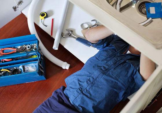 Plumber Fixing Sink