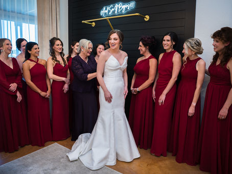Bride and her bridesmaids in the bridal suite