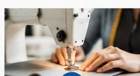 Professional tailor sewing a garment for alterations and repairs