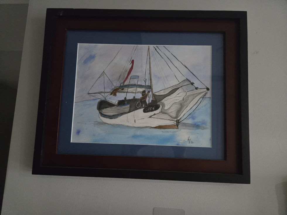 Framed watercolor painting of sailboat at sea