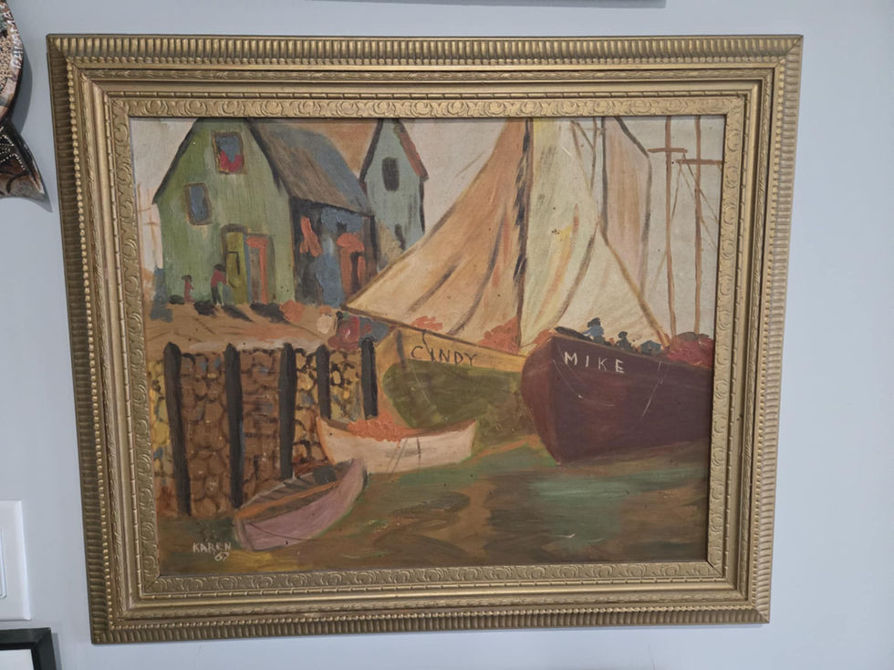 Framed painting: sailboat and houses