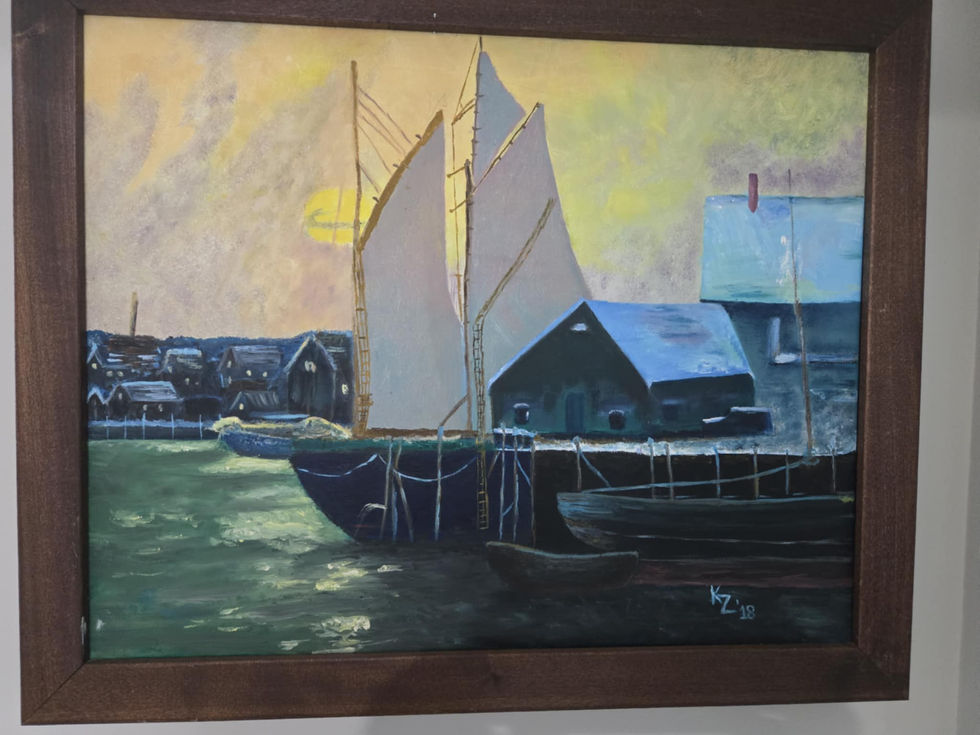 Sunrise over harbor; sailboat at dock