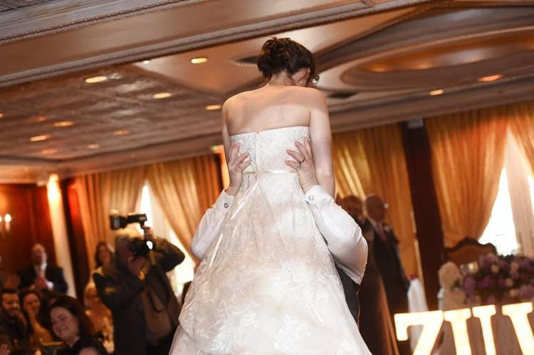 Bride lifted high, Wedding Moments, joyous reception