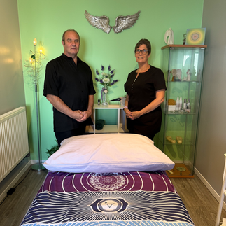Two Reiki Therapists one male one female