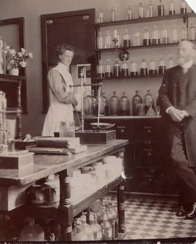 Miss Mulliner & Dr Gauld pose for the camera in the hospital pharmacy