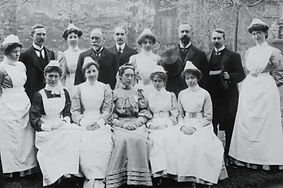 medical and nursing staff in the garden of the old Wood Street Infirmary, about 1900